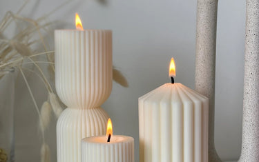 Three textured candles with varying ridges