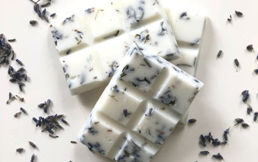 Rectangle wax melt bar that can be broken into pieces by hand sprinkled with lavender buds