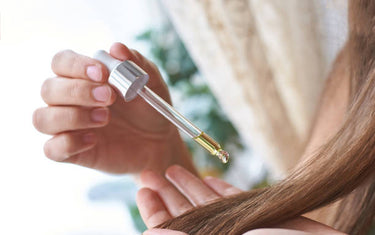 Applying oil onto hair