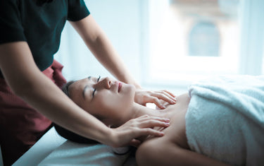 Woman getting a shoulder massage