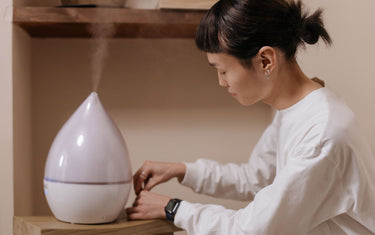 Woman with a humidifier
