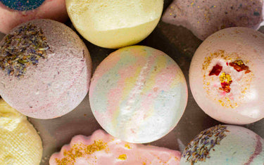 A group of colourful bath bombs/shower steamers.