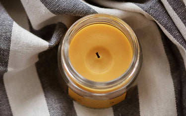 Yellow candle that's been blown out